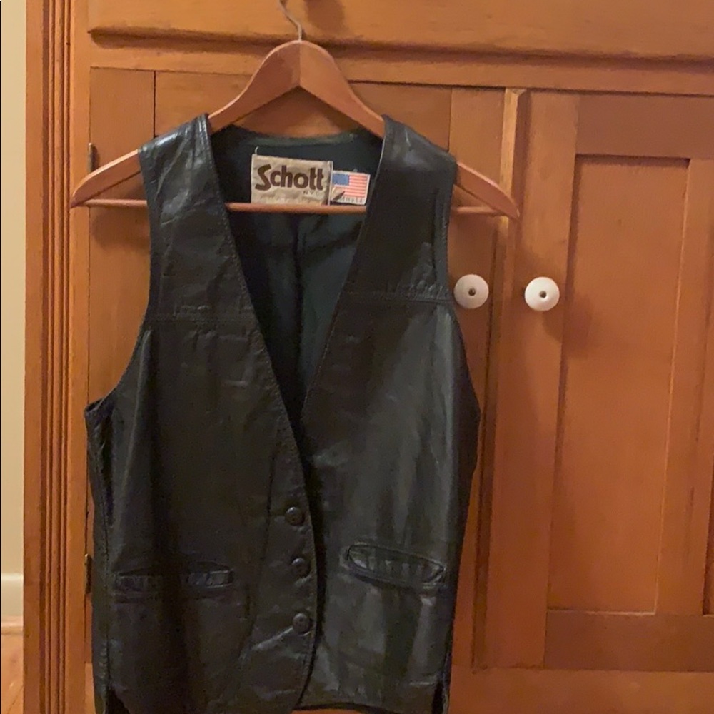 Vintage leather vest. Made in USA. Slightly worn.